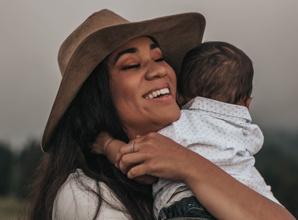 Woman holding her newborn baby